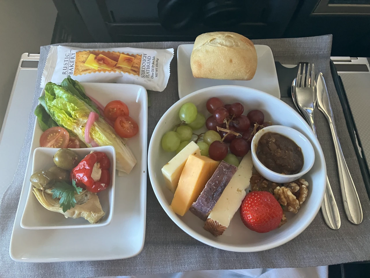 Cheese plate lunch with salad and stuffed pepper