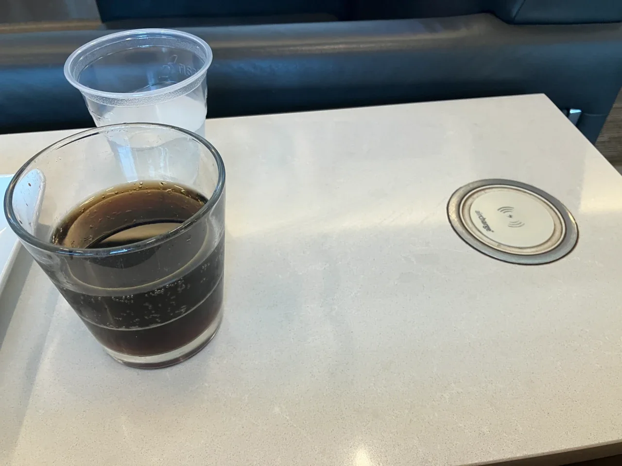 Wireless charging side table at the BOS Admirals Club