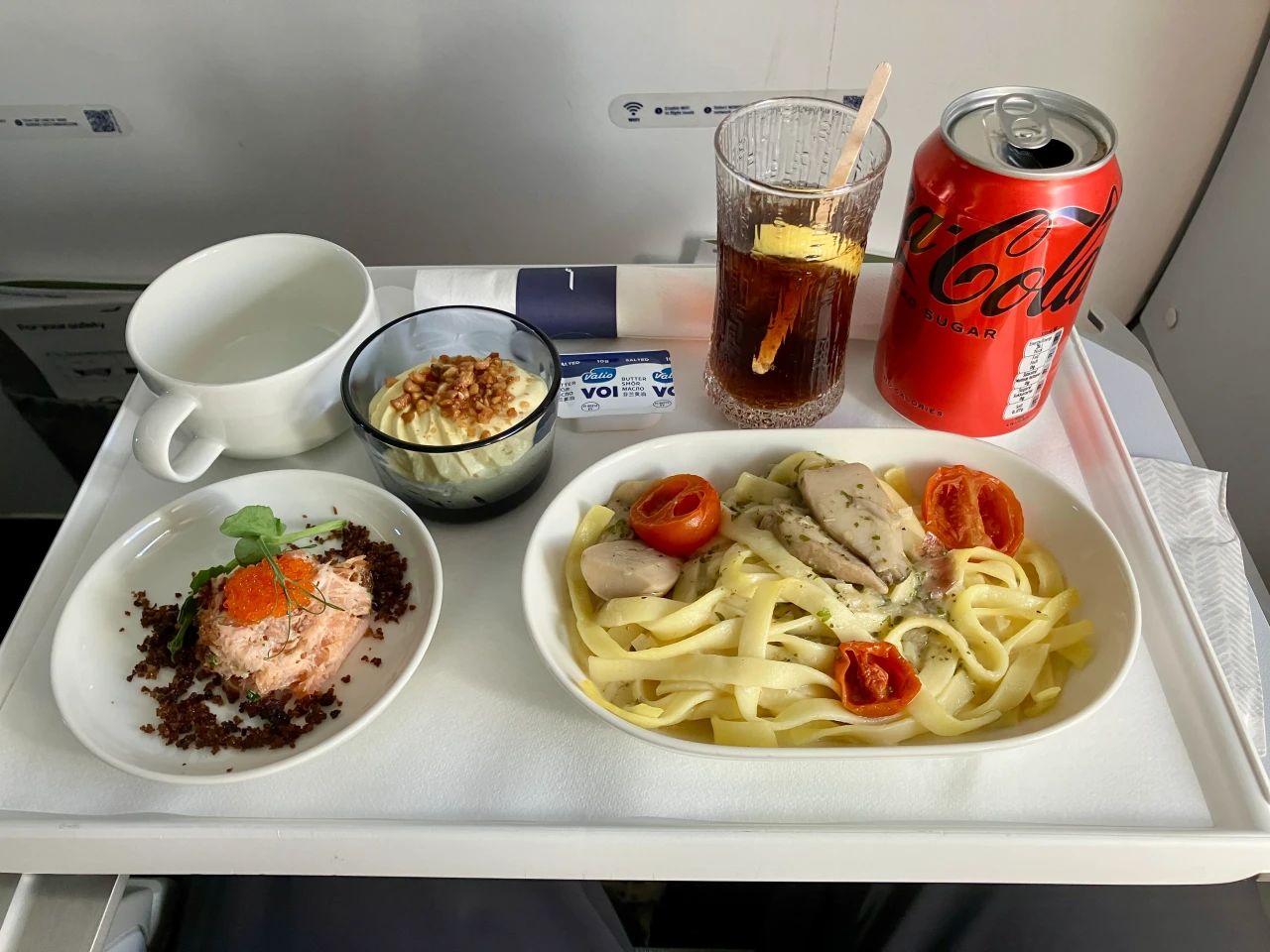 Finnair intra-European business class meal tray with bread and dessert
