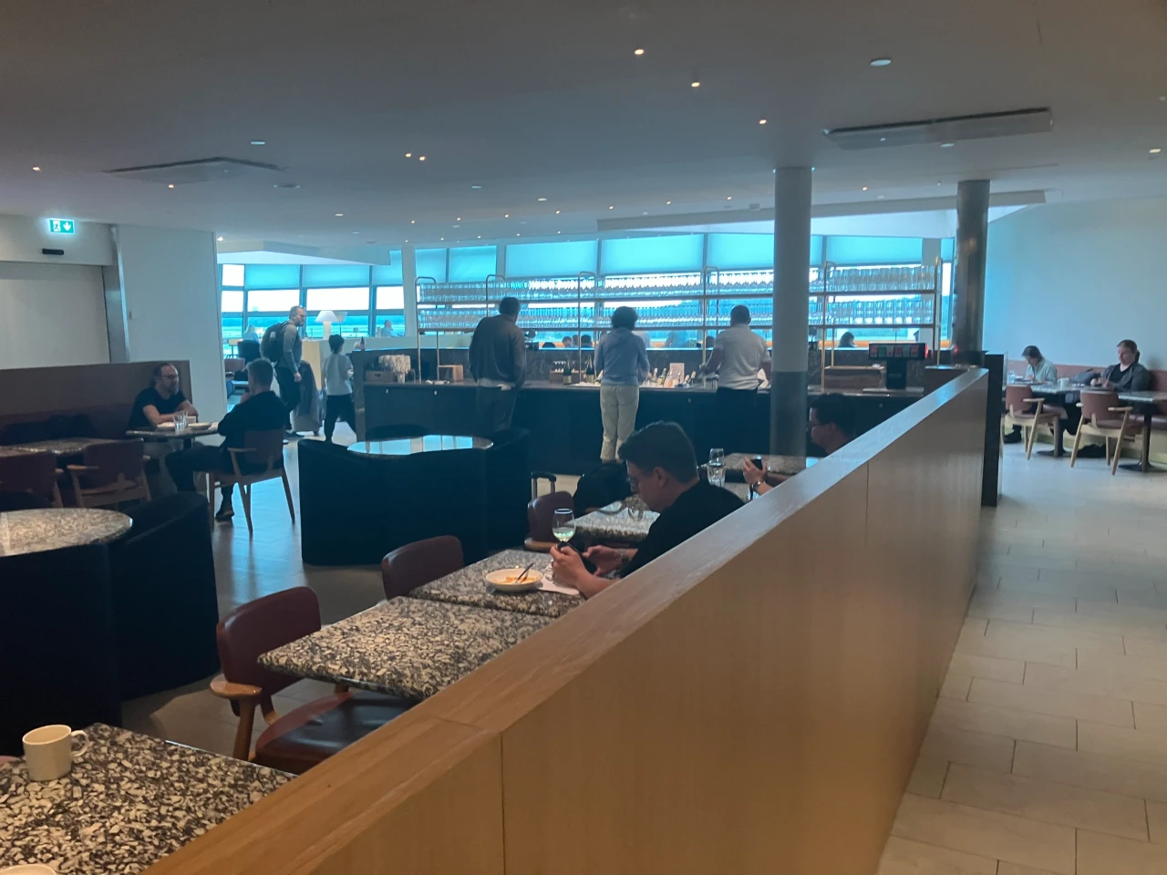 Dining area next to the buffet in Finnair's Schengen Lounge