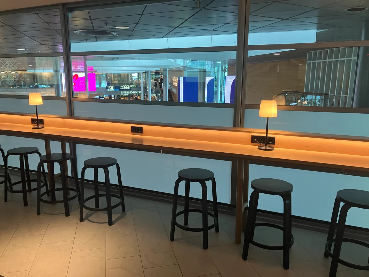 Quiet corner with private seating in Finnair's Schengen Lounge