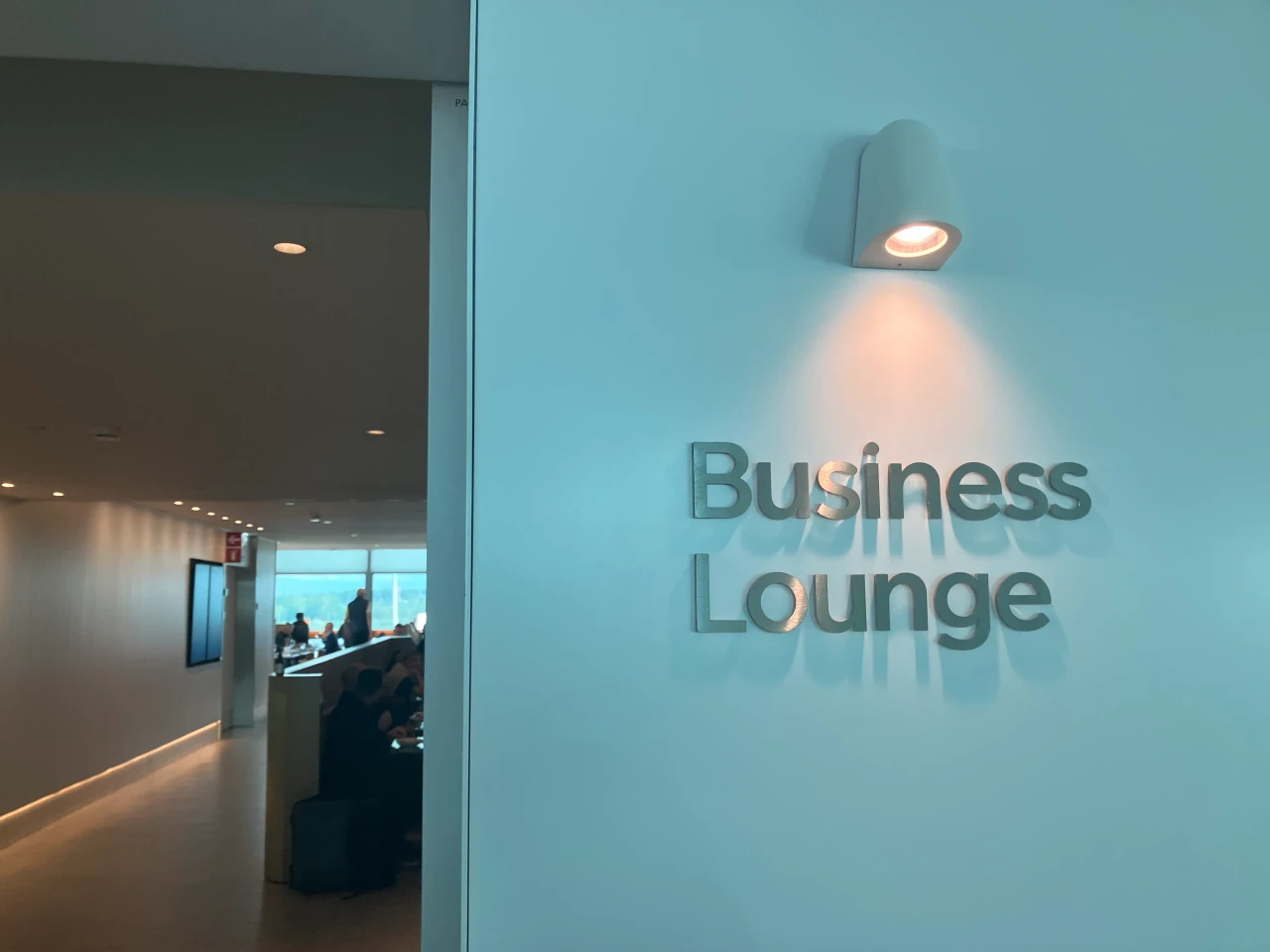 Finnair Schengen Lounge access signage at Helsinki Airport