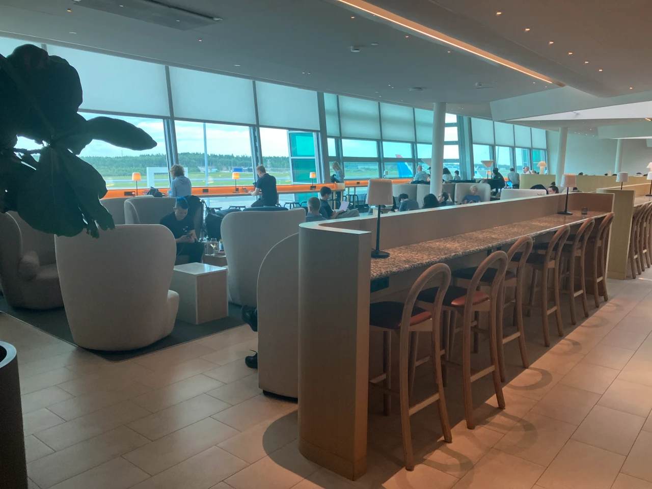 Window seating with tarmac views in Finnair's Schengen Lounge
